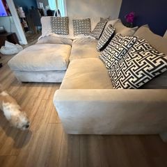 Corner sofa and foot poof