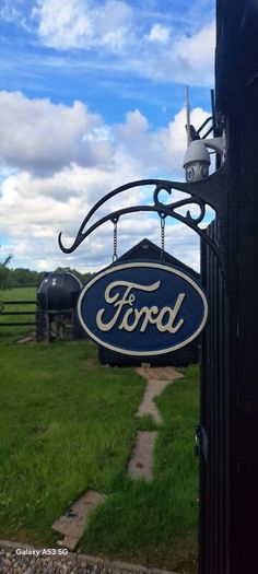 ford hanging  cast iron sign