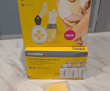 Unopened Medela Solo & extra bottles