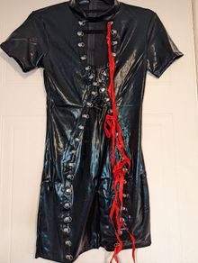 stunning PVC dress with red ribbon lace up detail in front