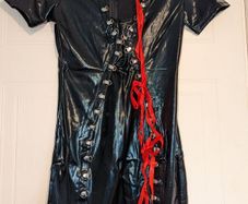 stunning PVC dress with red ribbon lace up detail in front