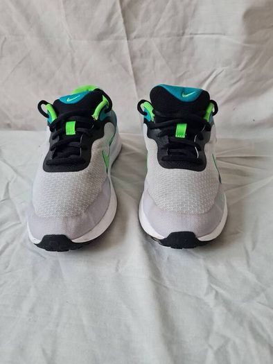 2024 nike revolution size 5.5 eu 38.5 grey/green in excellent condition