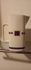 Silcut purple whiskey water jug