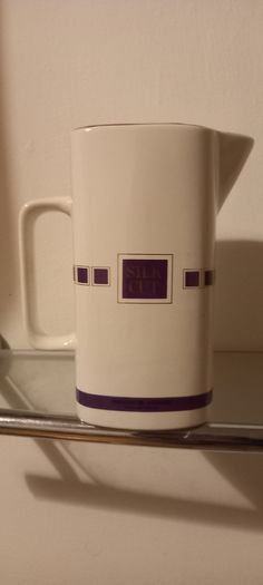 Silcut purple whiskey water jug