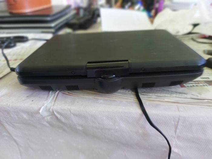 5 Portable DVD Players, all working, but no charges for them, all in very good condition