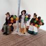 Vintage porcelain figurines family of balloon sellers by Royal Doultot . 85 euro each Image 9