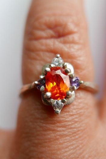 Vintage 925 Sterling Silver Ring with Central Orange Stone and Accent Stones