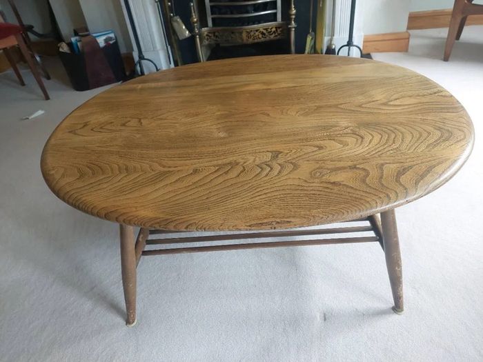Vintage Ercol style oval coffee table with magazine rack