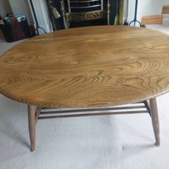 Vintage Ercol style oval coffee table with magazine rack