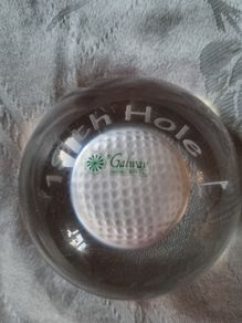 Galway Crystal paperweight with a golf ball