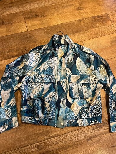 Bird print blue bomber jacket