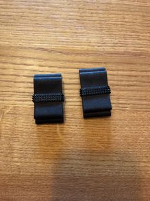 Clips for linking straps together