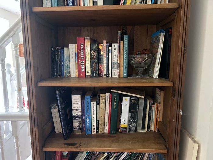 Solid wood bookshelf with bottom drawer
