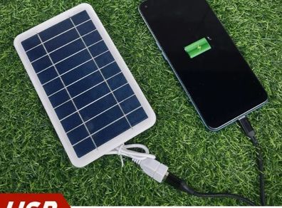 Solar Charger with USB conection. New, unopened.