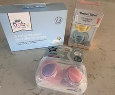 Free Baby soothers and sterilising bags