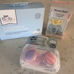 Free Baby soothers and sterilising bags