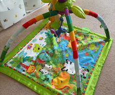 Baby play gym, rocking chair and toys
