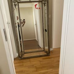 ornate silver mirror