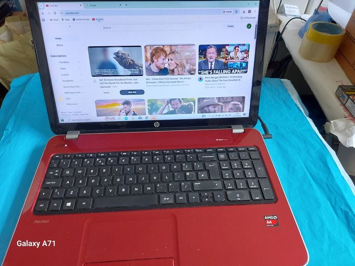 HP Pavillion, Red, AMD A4-5000 APU wiyj Radeo HD Graphics, 1.5GHz,  4GB Ram, 700GB HDD, Windows 10, Microsoft Edge, Chrome