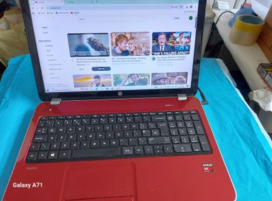 HP Pavillion, Red, AMD A4-5000 APU wiyj Radeo HD Graphics, 1.5GHz,  4GB Ram, 700GB HDD, Windows 10, Microsoft Edge, Chrome