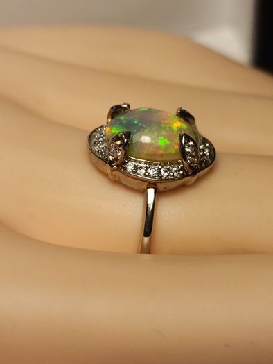 Ethiopian Welo Opal and Lab Grown Diamond Oval Cluster Ring.