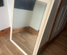 Large cream framed mirror