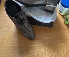 Lovely gold/brown shoes with a beautiful sequence on the heel