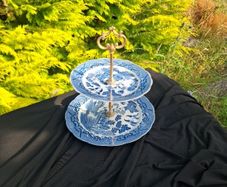 Blue willow style cake stand light chip at the back