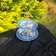 Blue willow style cake stand light chip at the back