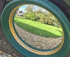 Round mirror called "witch's eye" in Napoleon III style, also "butler's mirror"