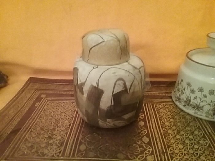 Two lidded Containers