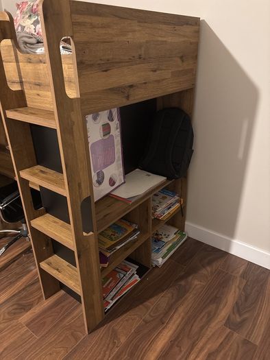 bunk bed with table and wardrobe