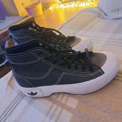 Black and white Adidas Nizza trek trainers