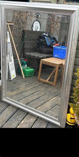 Large silver frame mirror with matching silver lamp