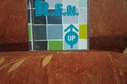 Cd R E M. Up.