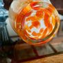 Mid Century Italian or Murano style Tall Swirl Pattern Orange and White Bud Vase 31 cm Image 5