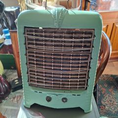Beautiful 1920s Green Hecla Electric Heater, It features a distinctive Enameled Metal Body with a top handle for portability., postage available or collection