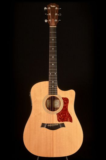 2003 Taylor 310-CE-L1. Limited edition. Koa back and sides. Includes OHSC.
