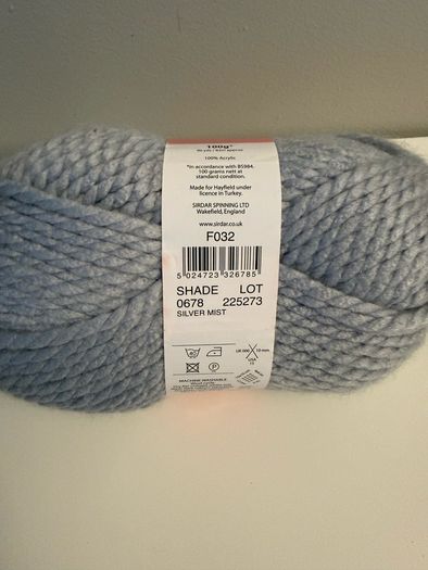 5 balls of grey yarn wool
