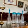 Set of Glass Genie Bottles with Turquoise Blue Flame Stoppers and Tall Containers with Mushroom Lids MCM Retro Image 2