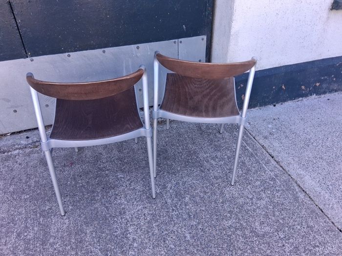 Pair of Piuma occasional chairs designed by Origlia