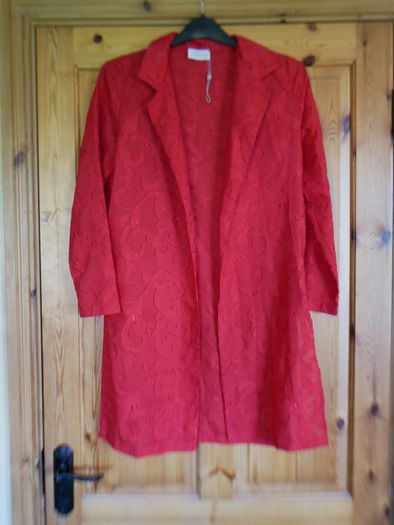 Ladies edge to edge top. Size 10. New. Red