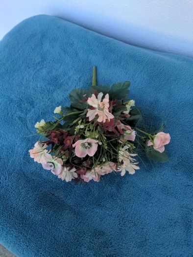 Small artificial bouquet of flowers