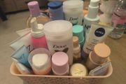 basket of mixed cleansers/lotions
