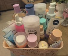 basket of mixed cleansers/lotions