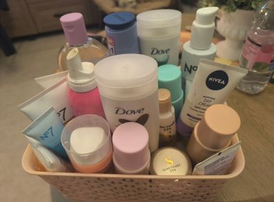 basket of mixed cleansers/lotions