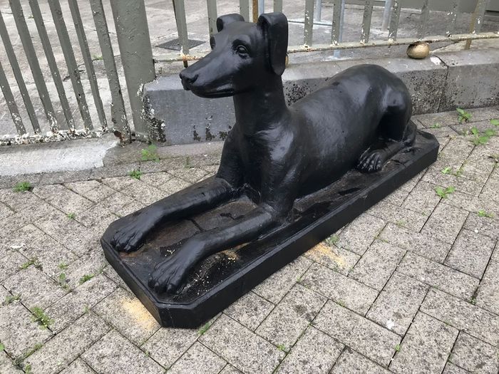 Pair of cast iron dog statues