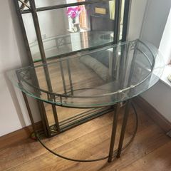 Metal framed hall mirror and matching glass top table