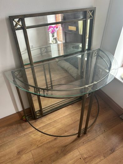 Metal framed hall mirror and matching glass top table