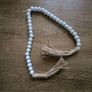 White beaded garland Image 2